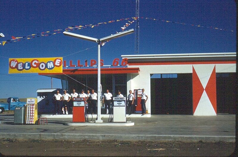 Historical Fronk Oil station decorated with banners